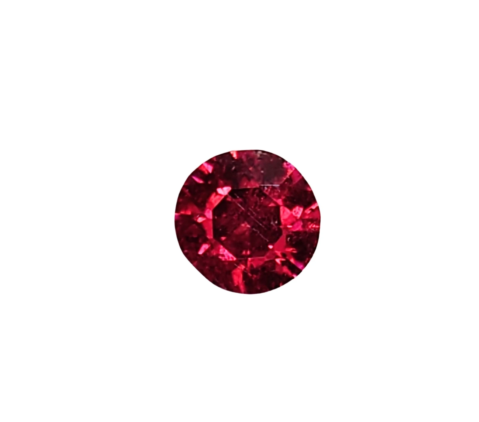 0.6ct Natural Round Faceted Malaya Garnet from Tanzania — view 1